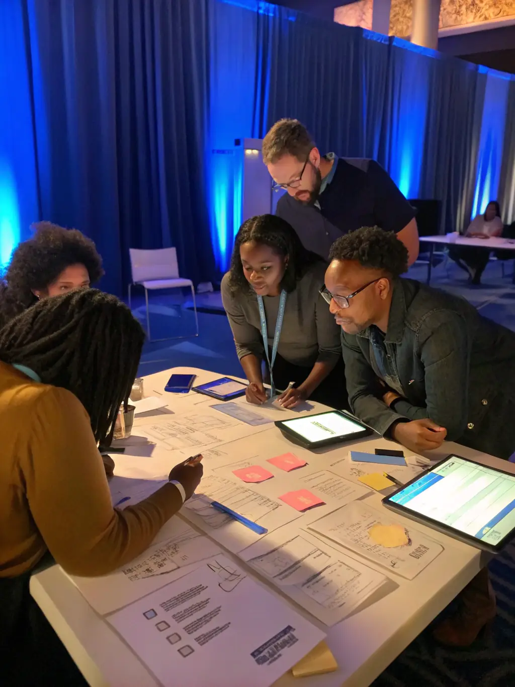 A diverse team is engaged in a strategic planning session, brainstorming ideas and developing long-term strategies.